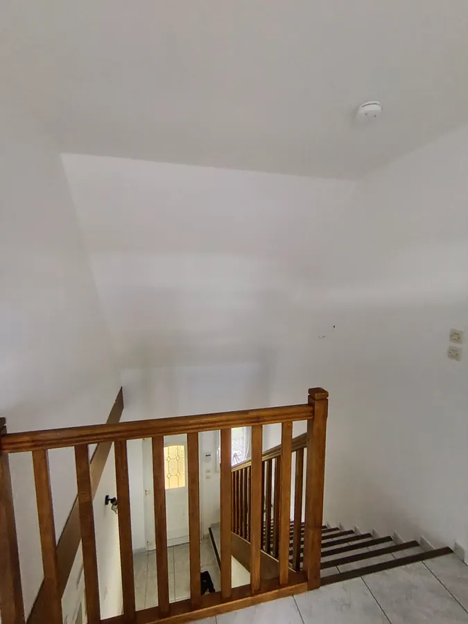 Couloir après travaux — résultat final, blanc propre